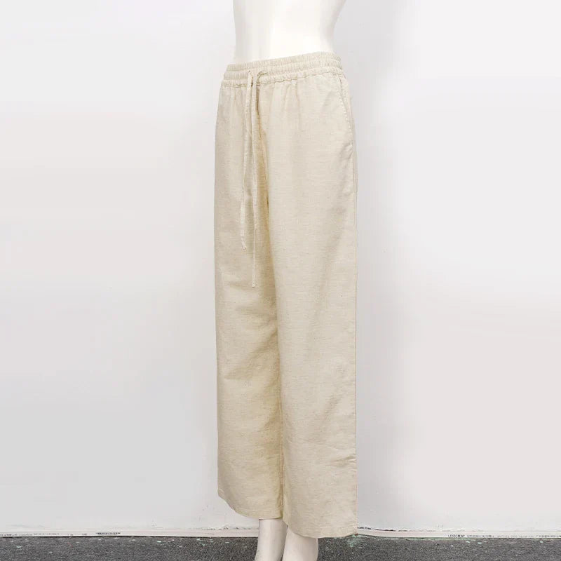 Women’s cotton linen wide-leg drawstring trousers with a loose fit and pull-on style, ideal for casual and comfortable wear.