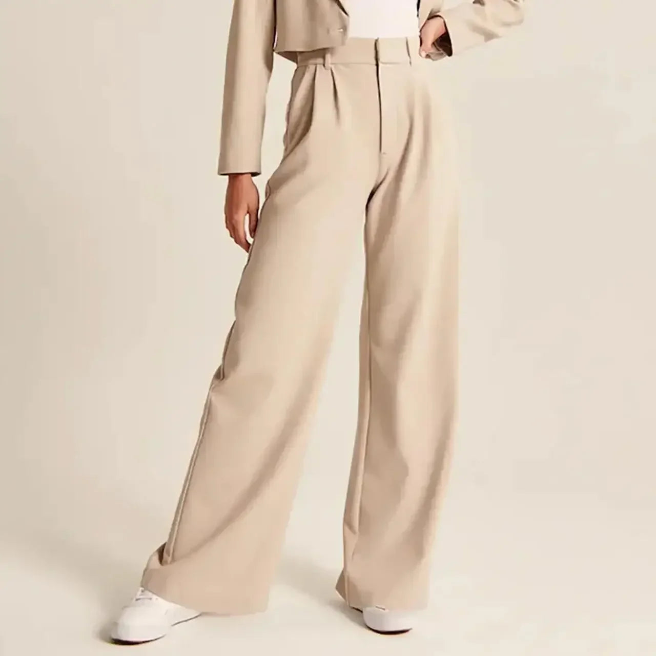 White wide-leg high-waist women's trousers with a relaxed fit and tailored design, perfect for modern, stylish outfits.