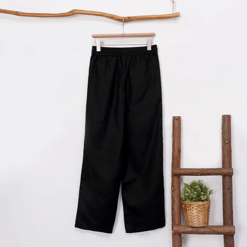 Light beige cotton linen wide leg drawstring trousers for women, loose pull-on style with comfortable fit and relaxed silhouette.