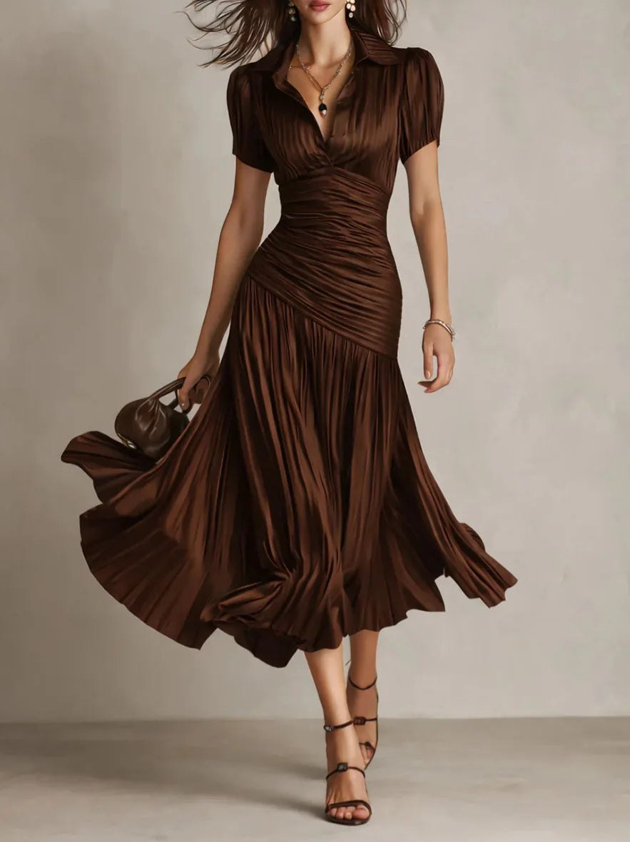 White pleated midi dress for women by Tammy Bradley, featuring a flowing design and elegant pleats, perfect for casual or formal wear.