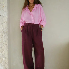 Women's high-waist wide-leg linen blend trousers with a loose pull-on design, shown in a neutral color, casual and comfortable style.