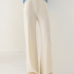Women’s Merino wool wide-leg joggers showing soft, cozy fabric and relaxed fit in neutral color.