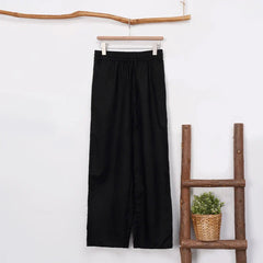 Light beige cotton linen wide-leg drawstring trousers for women, loose pull-on pants with relaxed fit and comfortable waistband.