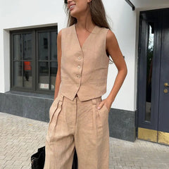 Women’s white wide leg linen trousers with high waist, stylish and comfortable pants for casual or dressy occasions.