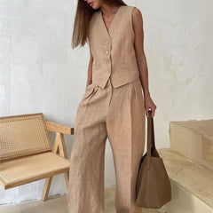 Women's white wide leg linen trousers with high waist, stylish and comfortable pants for casual or office wear.