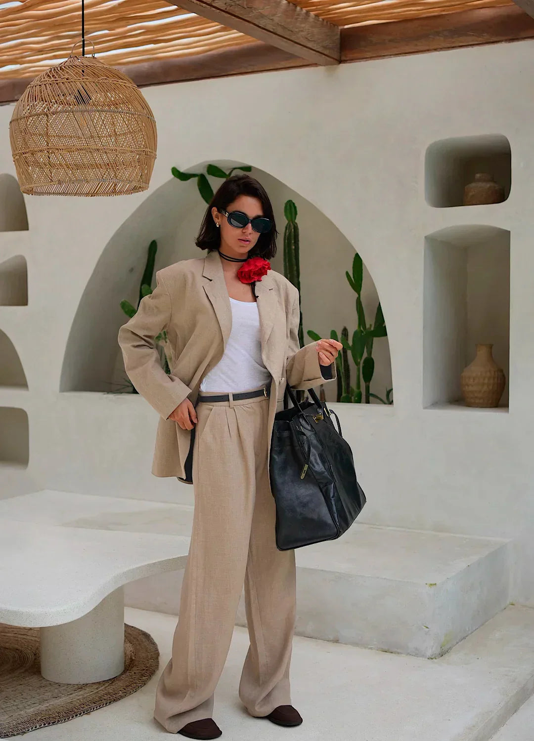 Women's high-waist wide-leg linen blend trousers, loose pull-on pants, in a relaxed fit, shown on a model.