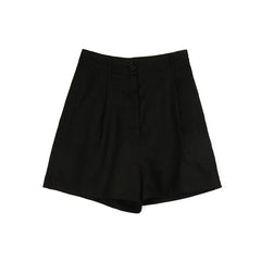 Women’s high-waist pleated linen shorts, tailored office shorts in a neutral color, styled for a polished, professional look.