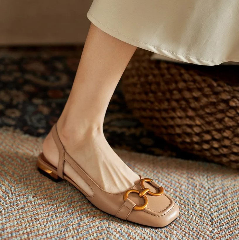 Orthopedic women's sandals with adjustable buckle straps and arch support, designed for comfort and foot health.