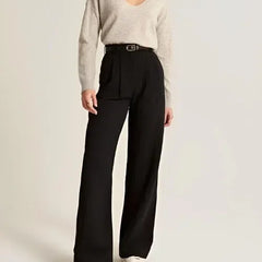 White wide-leg high-waist trousers for women, stylish high-waist pants with a relaxed fit and clean design.