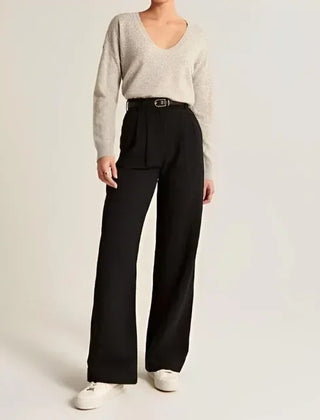 White wide-leg high-waist trousers for women, stylish high-waist pants with a relaxed fit and clean design.