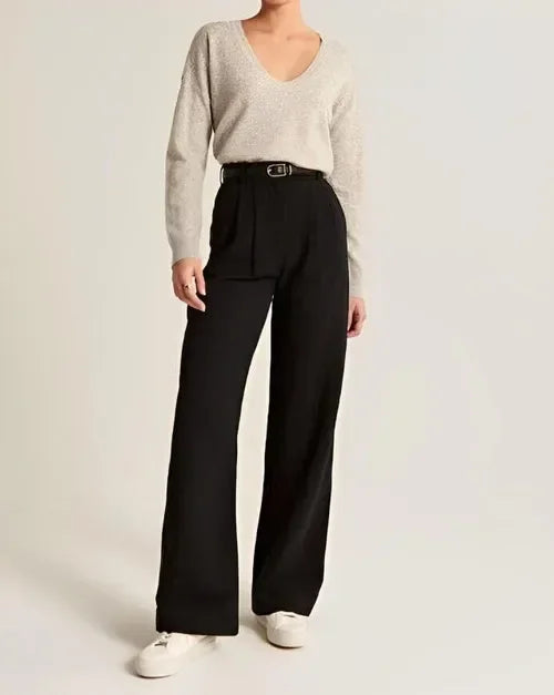 White wide-leg high-waist trousers for women, stylish high-waist pants with a relaxed fit and clean design.