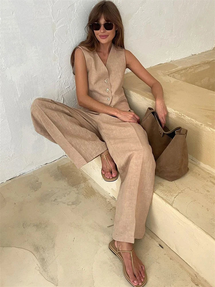 White women's wide leg linen trousers with high waist, stylish and comfortable for casual or dressy occasions.