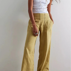 Blue denim wide-leg women's jeans with relaxed fit, featuring classic five-pocket design and belt loops.