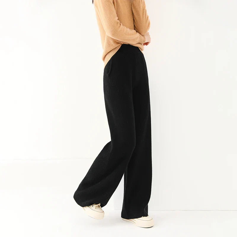 Women’s Merino wool wide leg jogger pants, soft and comfortable, shown in neutral color with relaxed fit and elastic waistband.