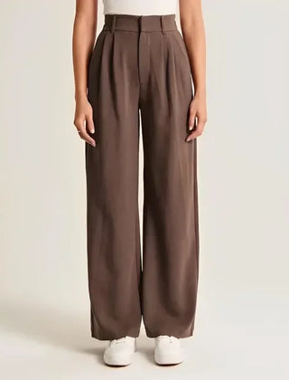 White wide-leg high-waist trousers for women, stylish and comfortable high-waist pants with a relaxed fit.
