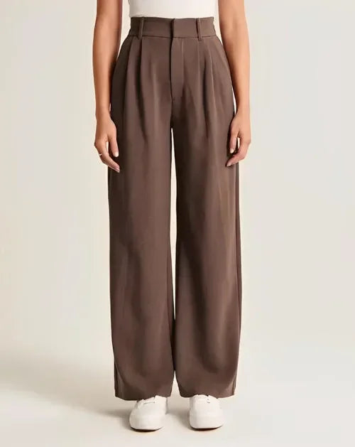 White wide-leg high-waist trousers for women, stylish and comfortable high-waist pants with a relaxed fit.