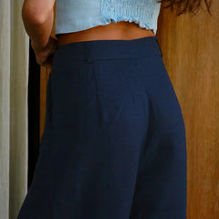 Women's high-waist wide-leg linen blend trousers with a loose, pull-on design, featuring a relaxed fit and casual style.