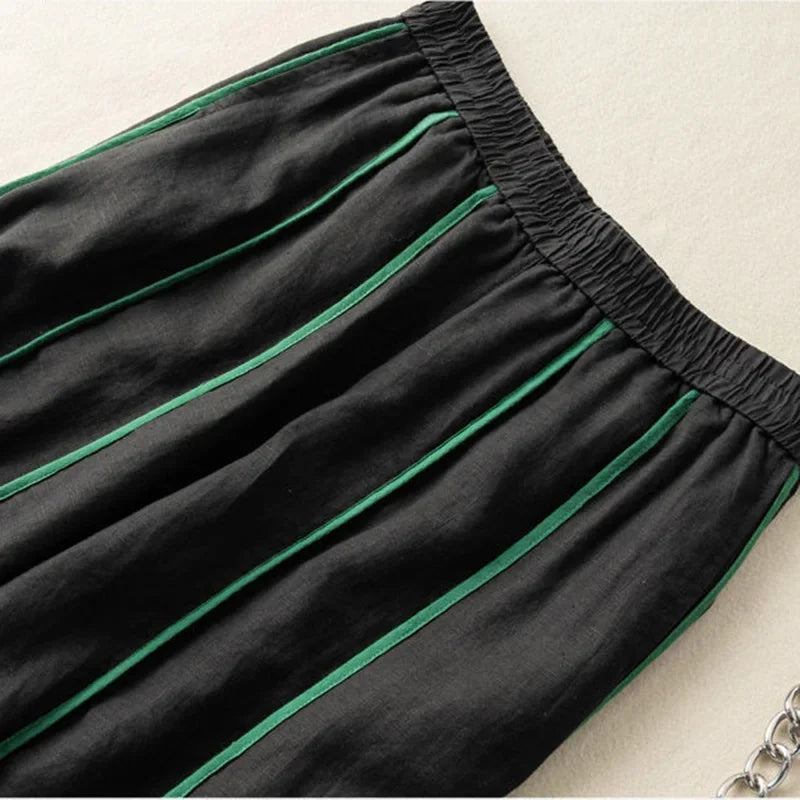 Striped wide-leg linen trousers for women with a loose fit and pull-on design, featuring a stylish casual look.