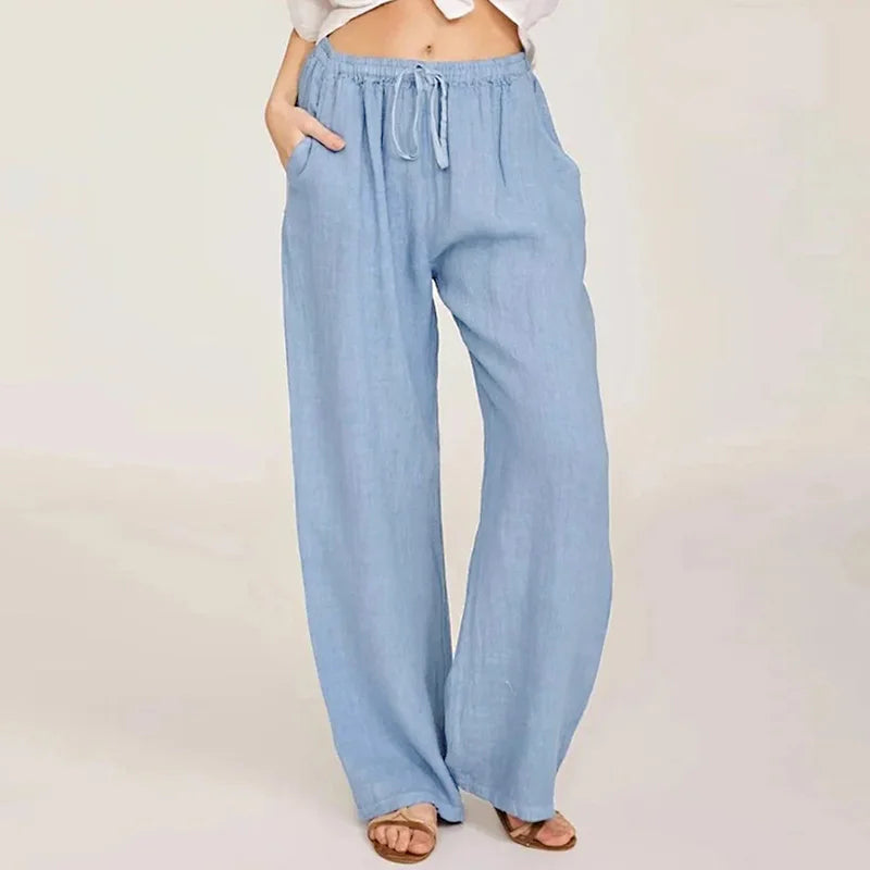 Women’s cotton linen wide-leg drawstring trousers with a loose pull-on fit, showcasing relaxed, comfortable stylish pants.
