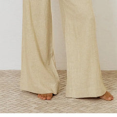Linen wide-leg loose pull-on trousers for women, shown in a relaxed fit with a high waist and natural linen texture.