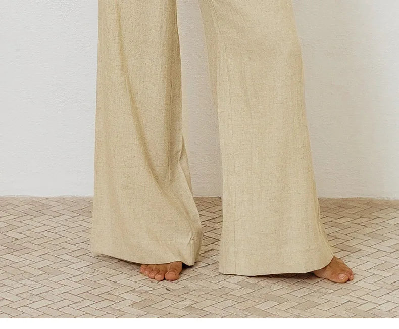 Linen wide-leg loose pull-on trousers for women, shown in a relaxed fit with a high waist and natural linen texture.