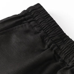 Light beige cotton linen wide-leg drawstring trousers for women, loose pull-on pants with a relaxed fit.