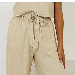 Linen wide-leg pull-on trousers for women with a relaxed fit, featuring a comfortable loose style and neutral color.