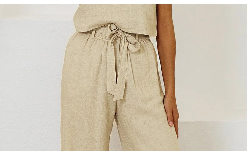 Linen wide-leg pull-on trousers for women with a relaxed fit, featuring a comfortable loose style and neutral color.