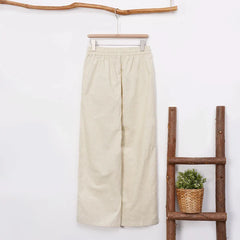 Women’s cotton linen wide-leg drawstring trousers with a loose fit and pull-on style, perfect for casual and comfortable wear.