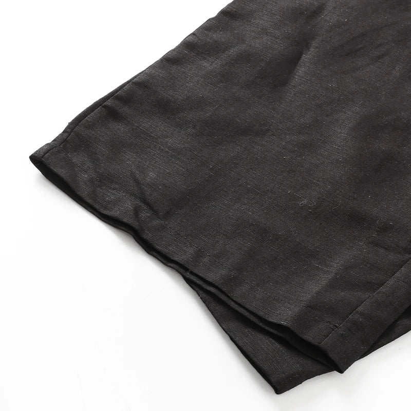 Women’s cotton linen wide-leg drawstring trousers with loose fit and pull-on design, ideal for casual and comfortable wear.