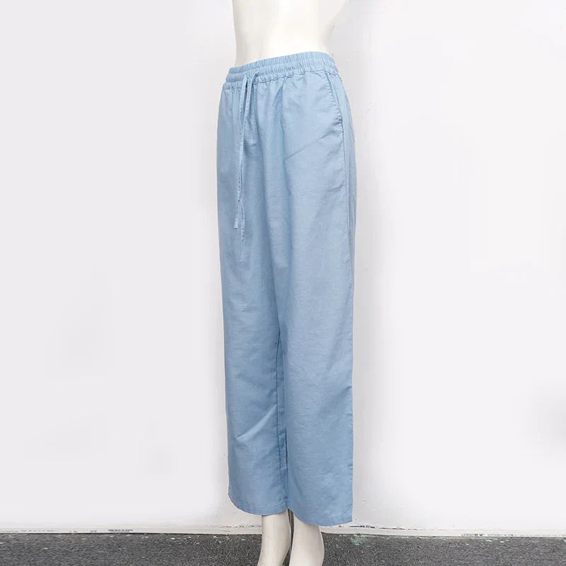 Women’s cotton linen wide-leg drawstring trousers with a loose fit and pull-on design, ideal for casual and comfortable style.
