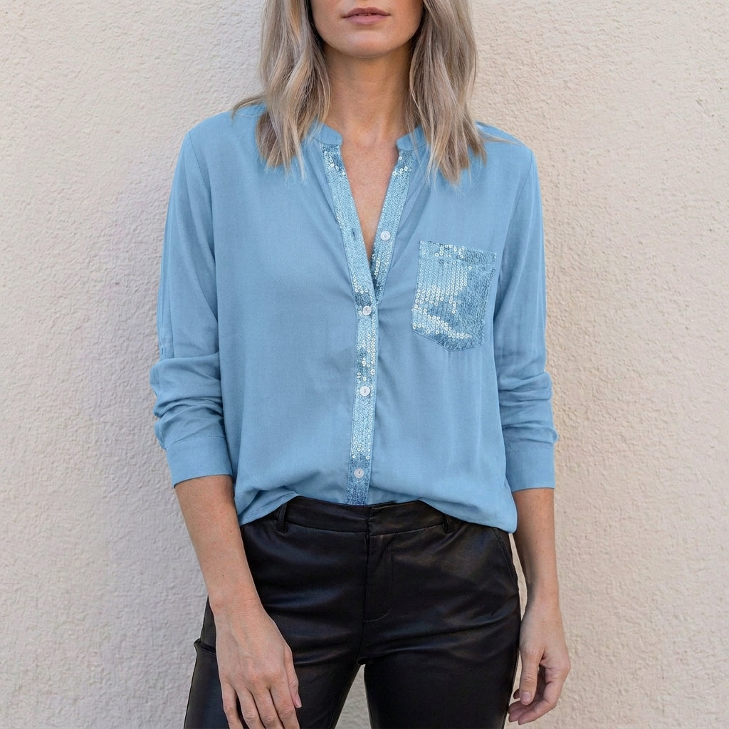 Sky blue women's summer blouse with V-neck and button front, denim top for women, stylish and casual top.