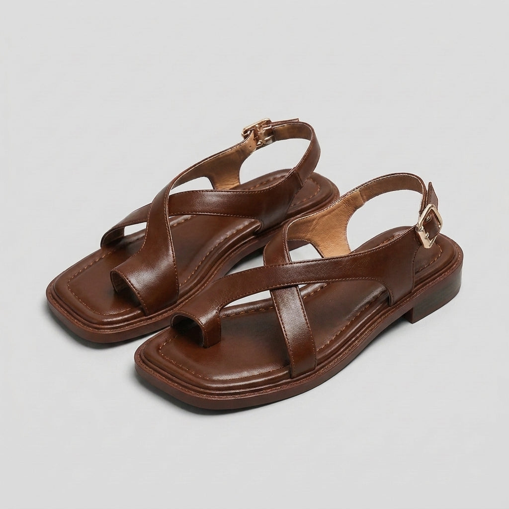 Square-toe block-heel criss-cross sandals for women by Tammy Bradley, featuring stylish design and comfortable fit.