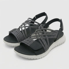 Orthopedic criss-cross strappy sandals for women with adjustable fit, featuring supportive design and stylish look.