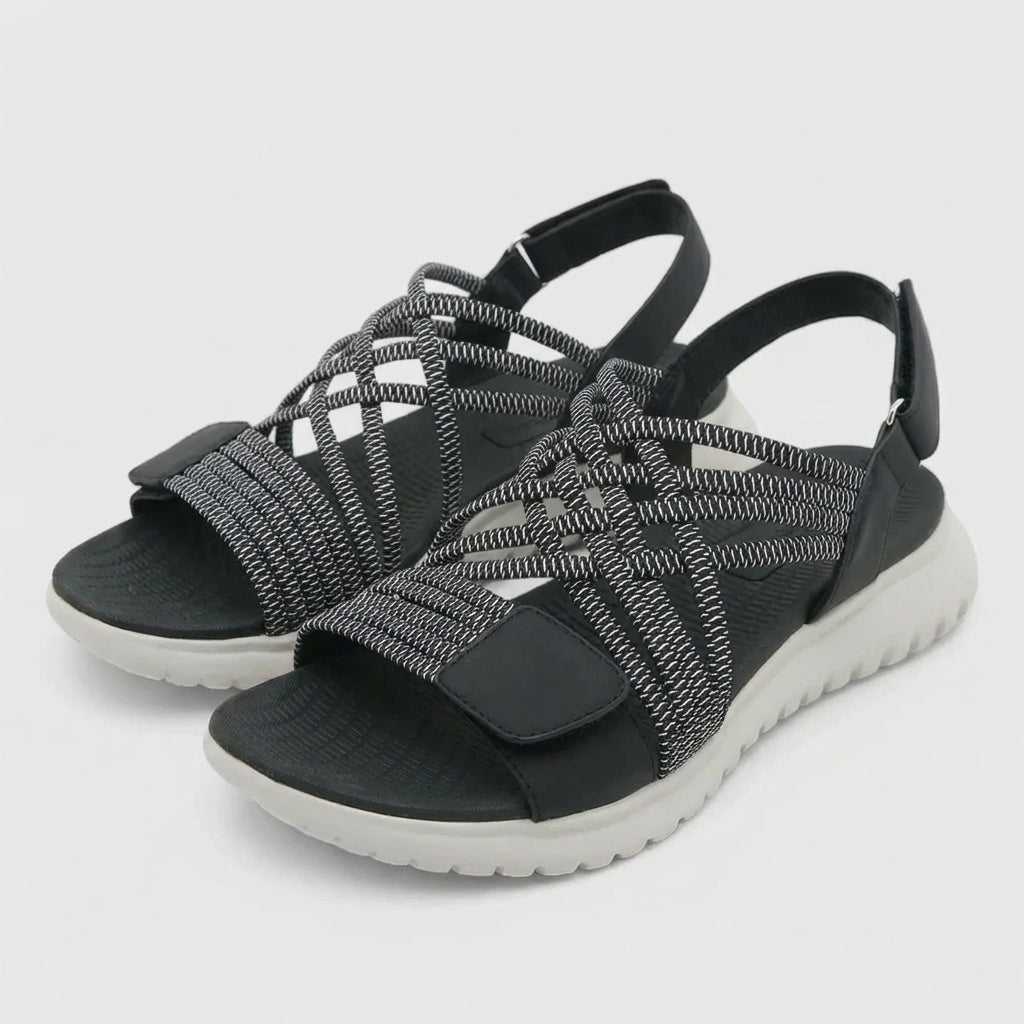 Orthopedic criss-cross strappy sandals for women with adjustable fit, featuring supportive design and stylish look.