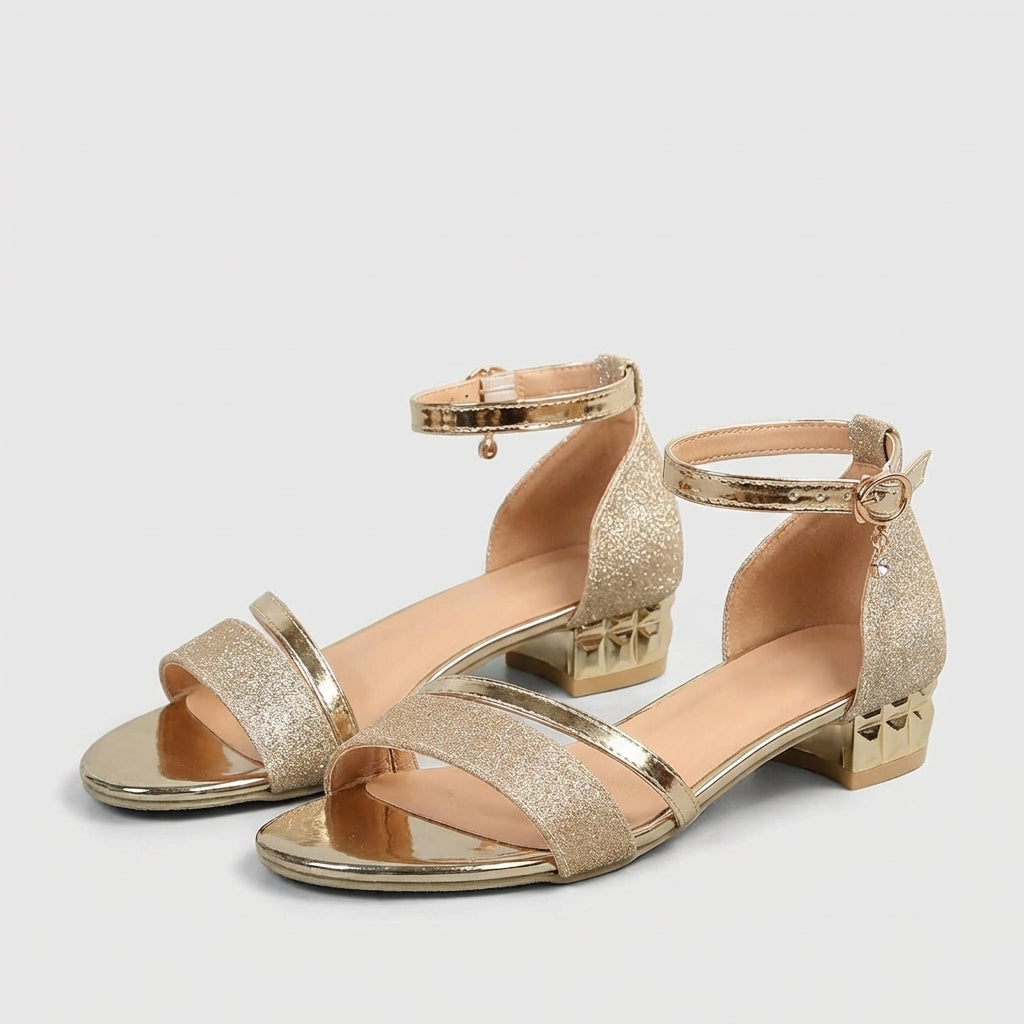Tammy Bradley metallic block-heel ankle-strap sandals for women, featuring a shiny finish and open toe design.