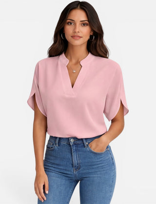 Lightweight women's chiffon blouse with V-neck, casual summer top in soft pastel color, perfect for warm weather.