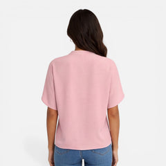 Lightweight women's chiffon blouse with a V-neck, casual summer top in soft pastel color, perfect for warm weather.