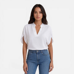 Lightweight women's chiffon V-neck blouse in soft summer colors, casual style, perfect for warm weather.