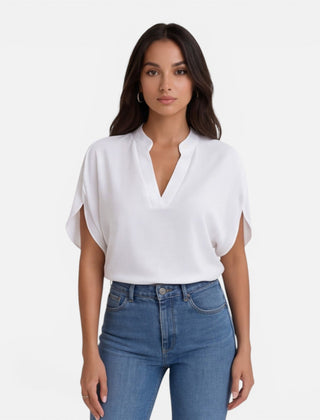 Lightweight women's chiffon V-neck blouse in soft summer colors, casual style, perfect for warm weather.
