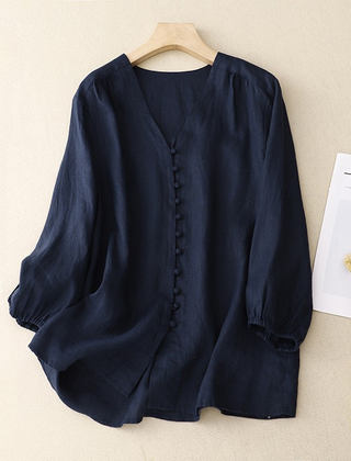V-neck linen summer blouse for women featuring lightweight fabric and relaxed fit, ideal for warm weather.