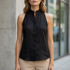 Sleeveless denim summer blouse for women, casual top with relaxed fit, shown untucked, stylish and breathable women's clothing.