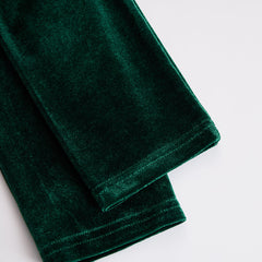 Velvet midi evening dress featuring a fitted silhouette and elegant design, perfect for formal occasions.