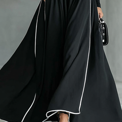 White long sleeve maxi dress for women, flowing fabric, fitted waist, and elegant style perfect for casual or formal occasions.