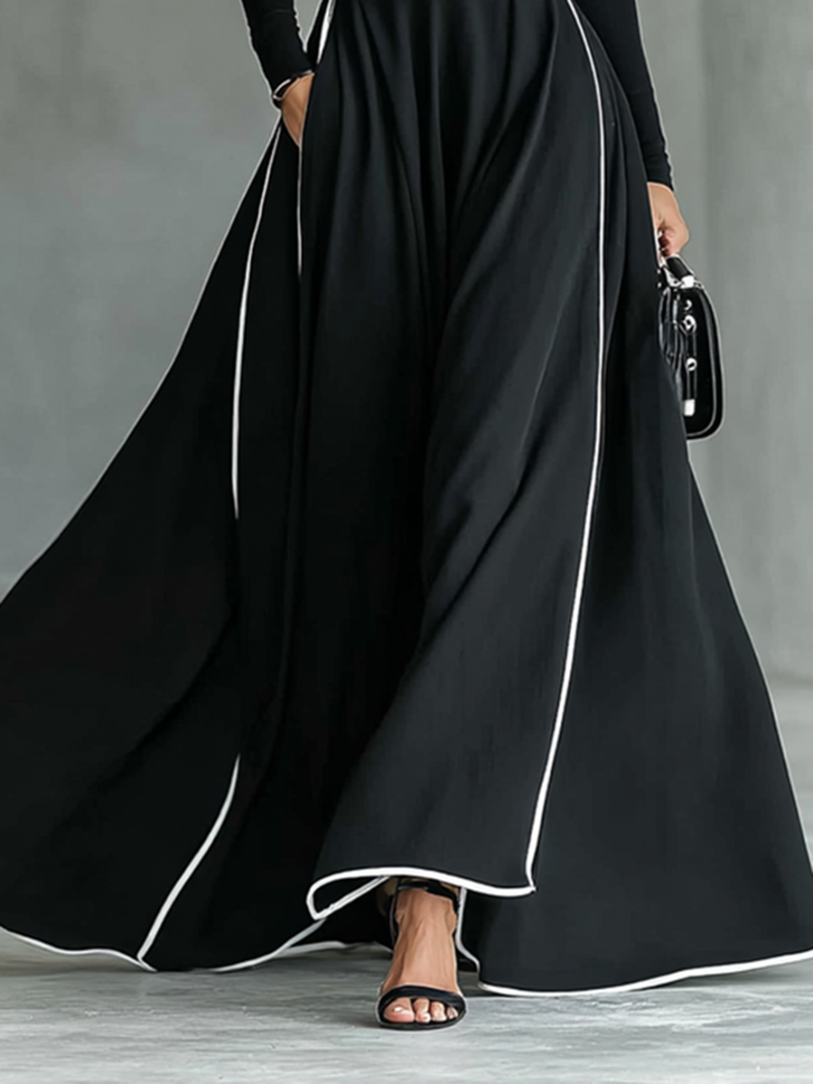 White long sleeve maxi dress for women, flowing fabric, fitted waist, and elegant style perfect for casual or formal occasions.