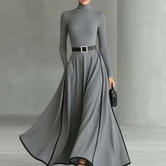White long sleeve maxi dress for women with a flowing silhouette, featuring a round neckline and elegant design.