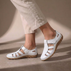 White Cutout Fisherman Sandals for Women by Tammy Bradley showing open-toe design, adjustable ankle strap, and woven cutout details