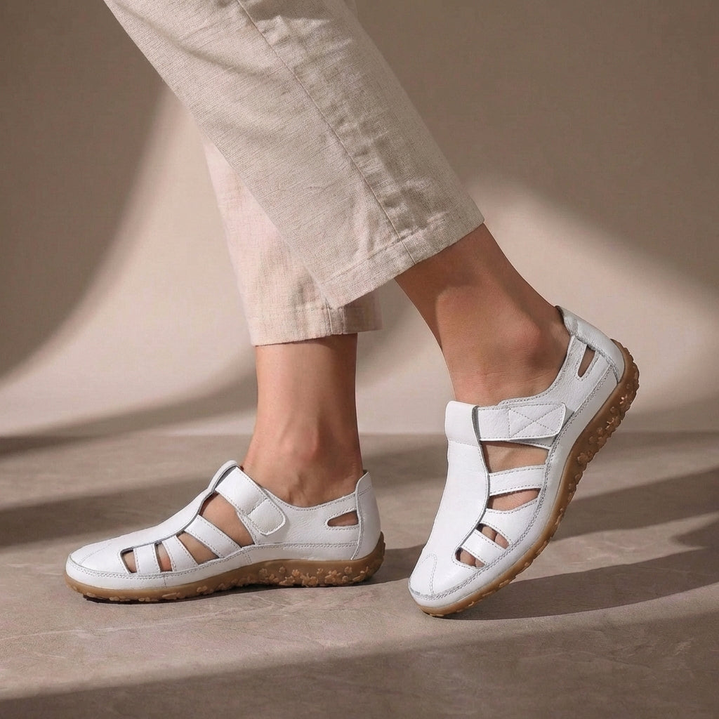 White Cutout Fisherman Sandals for Women by Tammy Bradley showing open-toe design, adjustable ankle strap, and woven cutout details