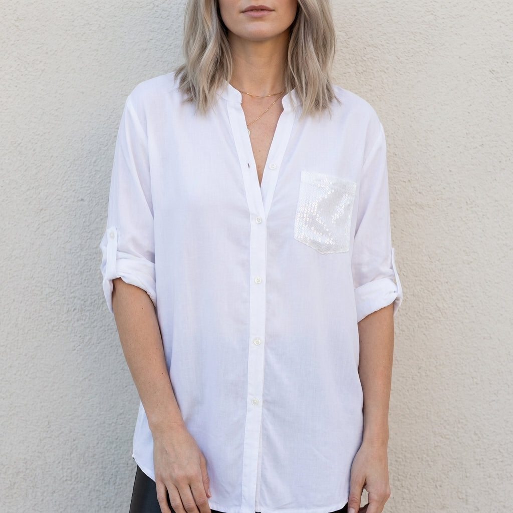 White women's summer blouse with V-neck and denim button front, casual top perfect for warm weather.