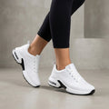 White knit sneakers for women by Tammy Bradley, showing a close-up of the comfortable, stylish women's shoes.